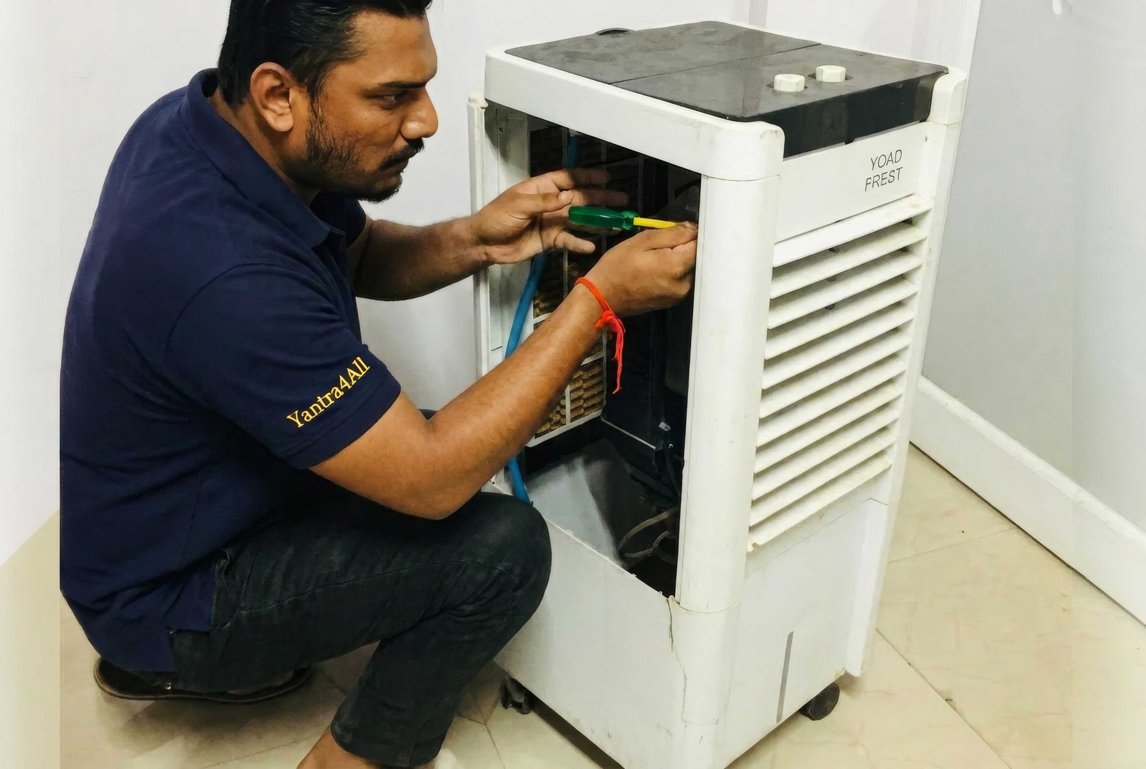 Technician repairing an air cooler at a customer's home